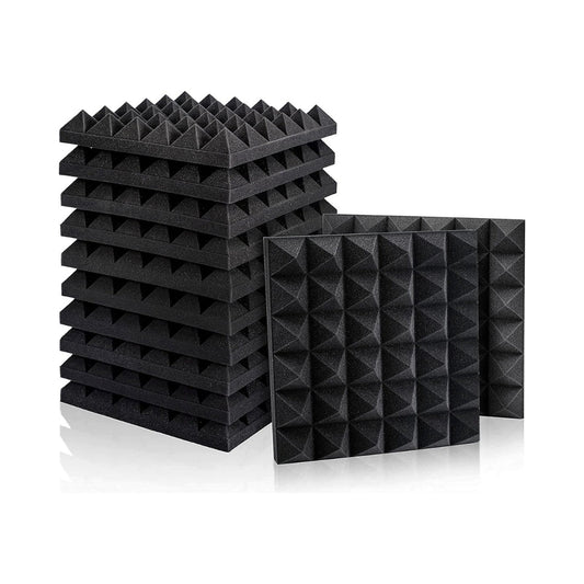 A stack of black acoustic foam panels with pyramid-shaped peaks, designed for soundproofing and noise reduction in rooms.